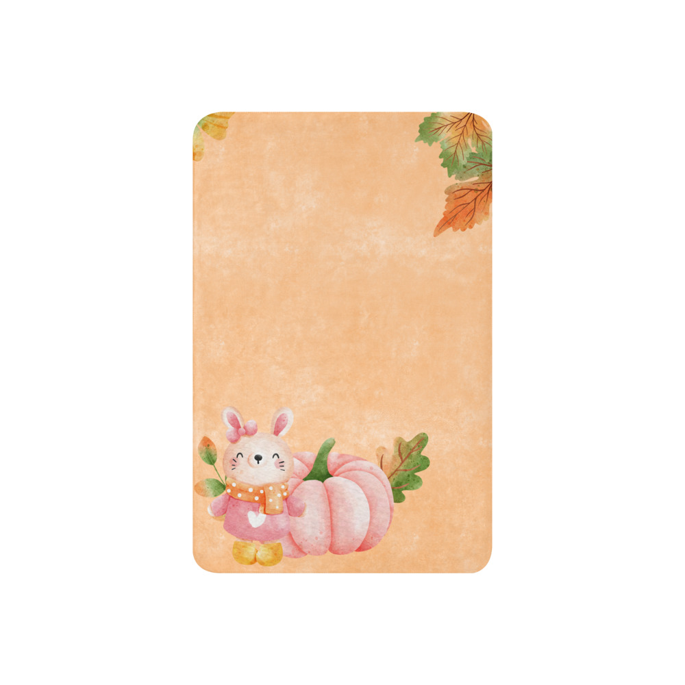 Manta mullida con conejita y calabaza en fondo color salmón con hojas de otoño - Imagen 11
