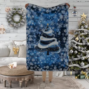 Manta con diseño de Árbol de fantasía en forma de Merengue sobre fondo azul de invierno y copos de nieve