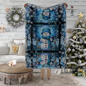 Manta con Ventana de Muñeco de Nieve con Gorro y Bufanda en fondo Azul